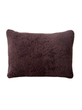 a shearling lumbar pillow in chocolate brown shearling