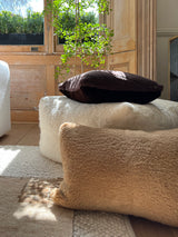 a square shearling pillow in chocolate brown shearling