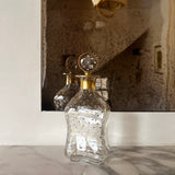 Antique French decanter with gold star stopper
