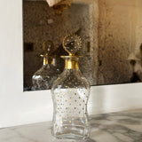 Antique French decanter with gold star stopper