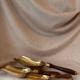 Trio of antique brass scoops