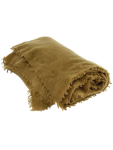Fringed cashmere throw in Ocre