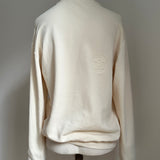 a comfy easy to wear sweatshirt in cream ivory with 'vintage' embroidered upside down for an abstract look