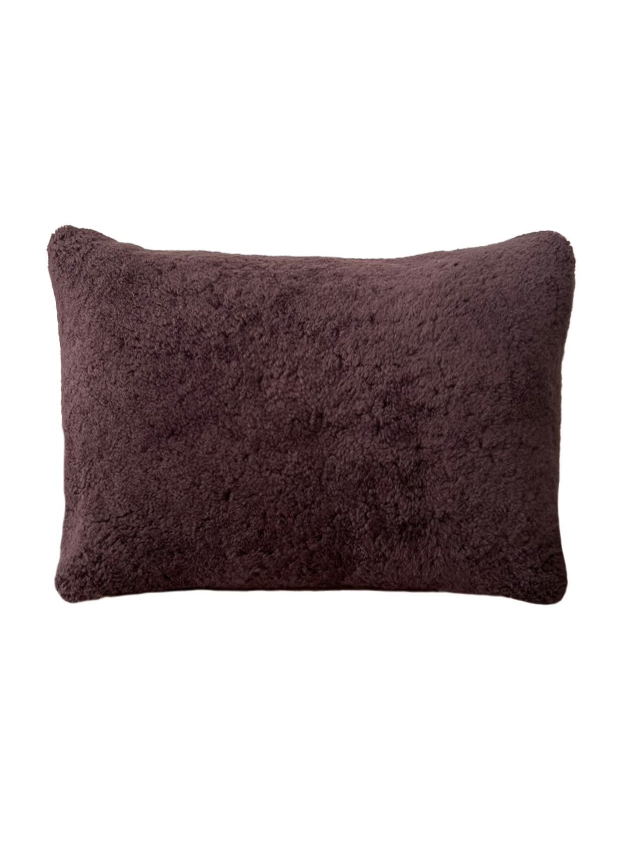 a shearling lumbar pillow in chocolate brown shearling