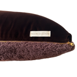 a square shearling pillow in chocolate brown shearling and plush velvet, with an exposed brass zipper