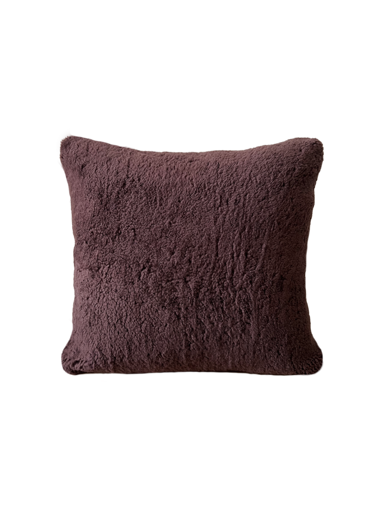 a square shearling pillow in chocolate brown shearling