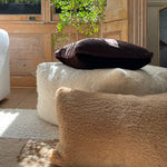 a shearling lumbar pillow in chocolate brown shearling